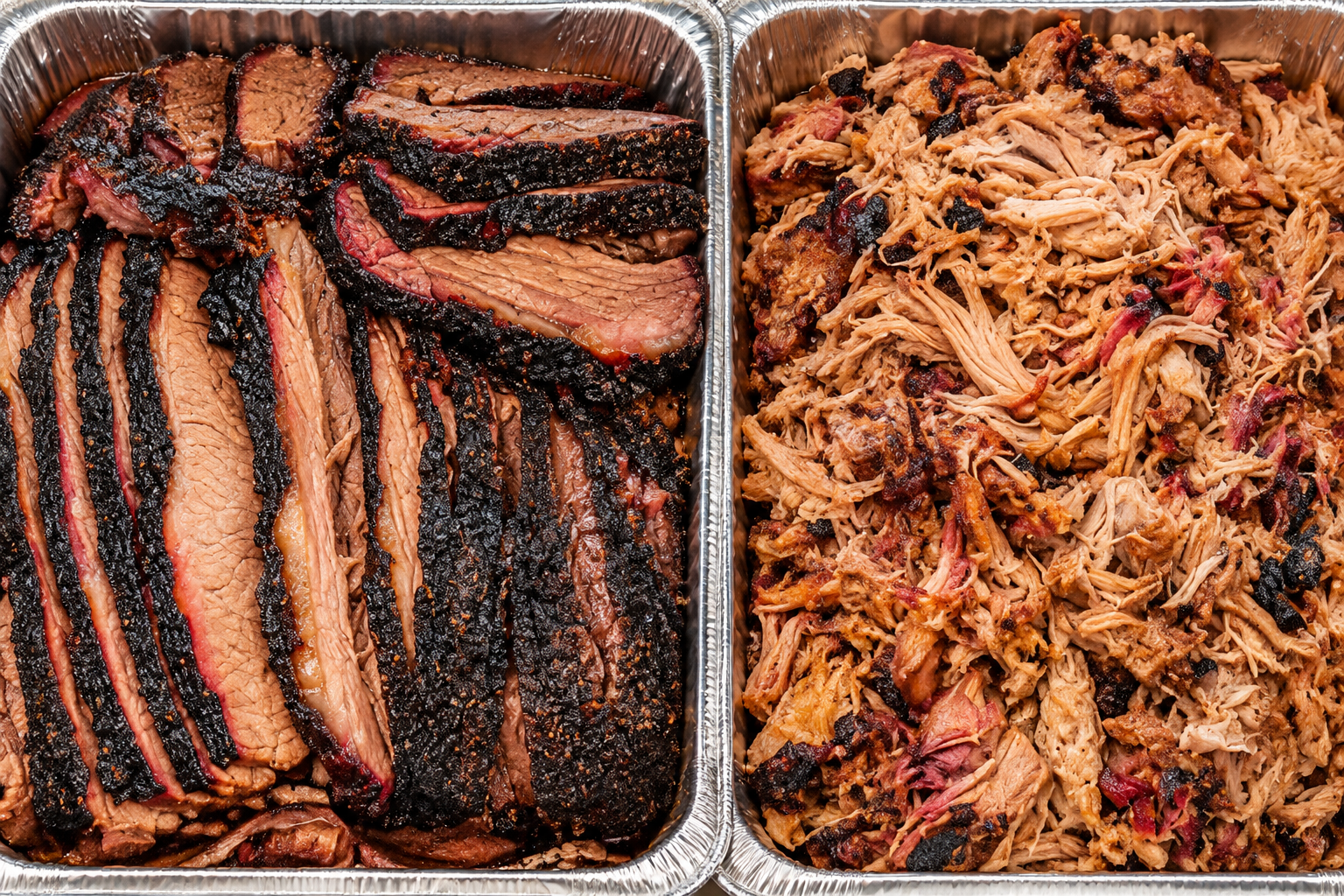Sliced smoked brisket and pulled pork in catering trays